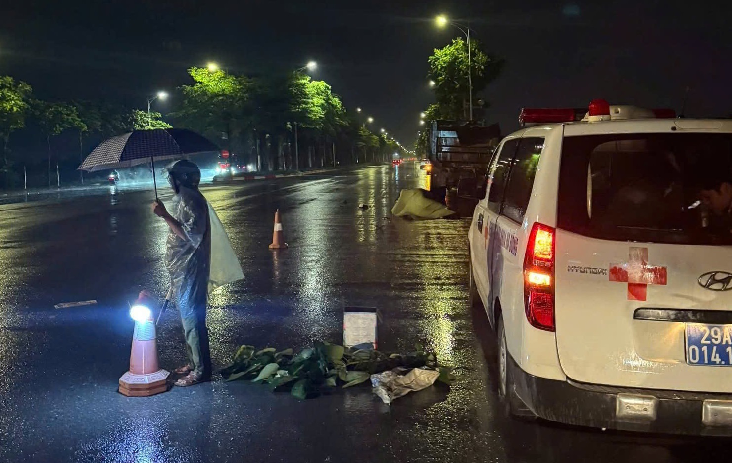 Two fatalities after collision with dump truck in rain