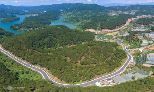 A winding road through pine forests, Tuyen Lam Lake in Da Lat