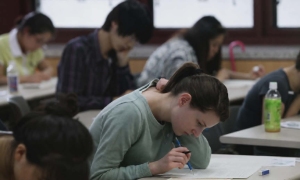 TOPIK exam papers advertised for a "guaranteed pass," priced over 5,000 USD