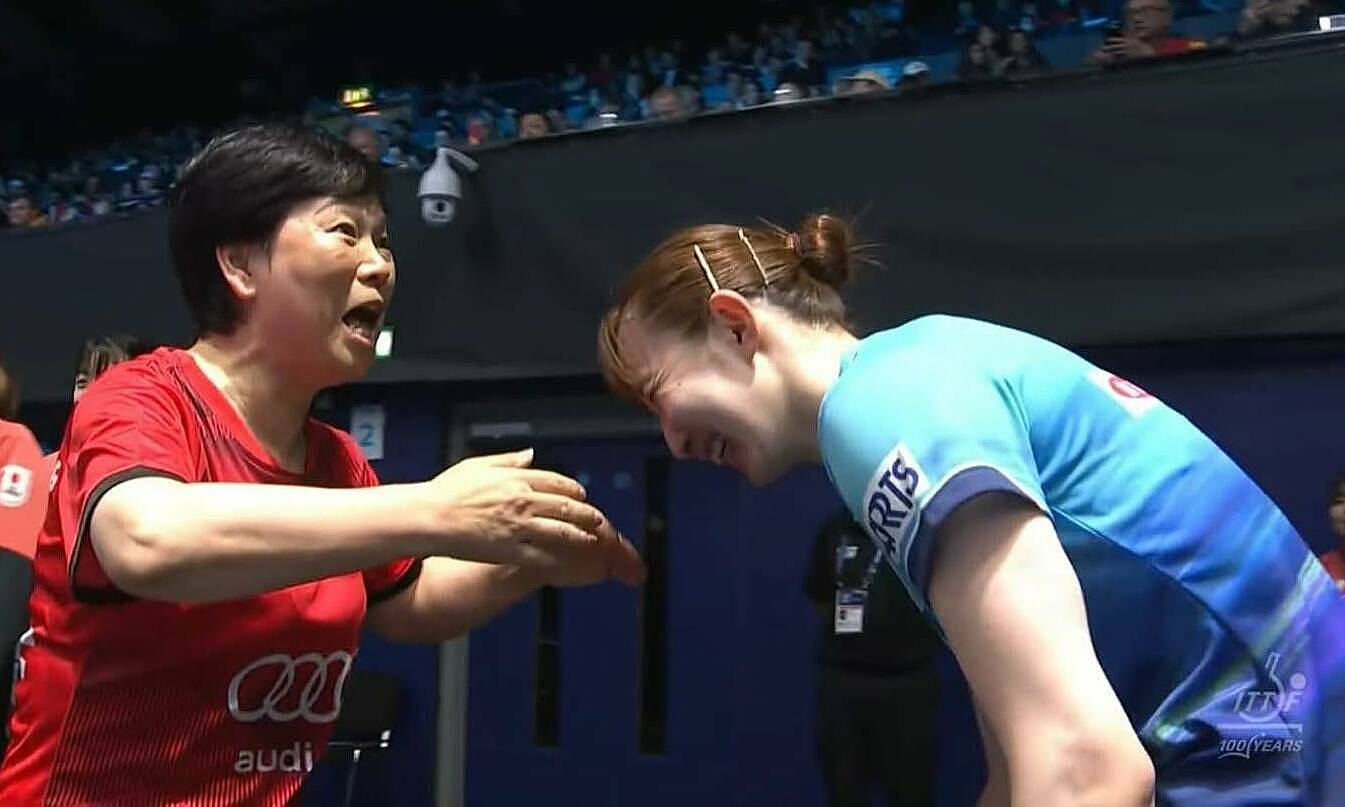 Japanese player bows deeply after defeating 62-year-old opponent