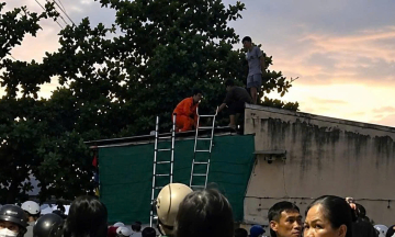 Sixth-grade student dies from electric shock while climbing roof for ball