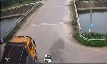 Speeding through intersection, student crashes under truck