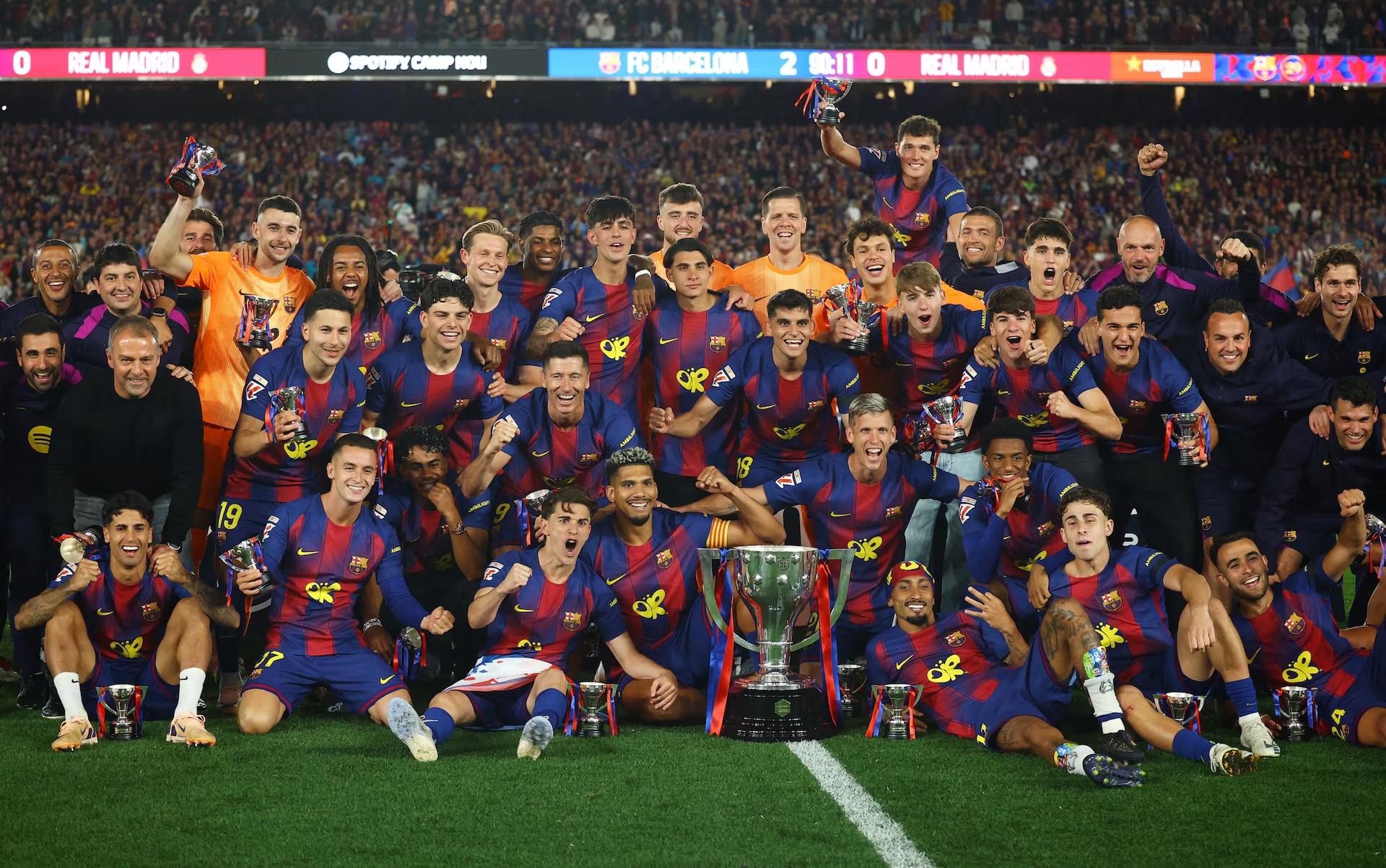 Barca defeats Real, defends La Liga title