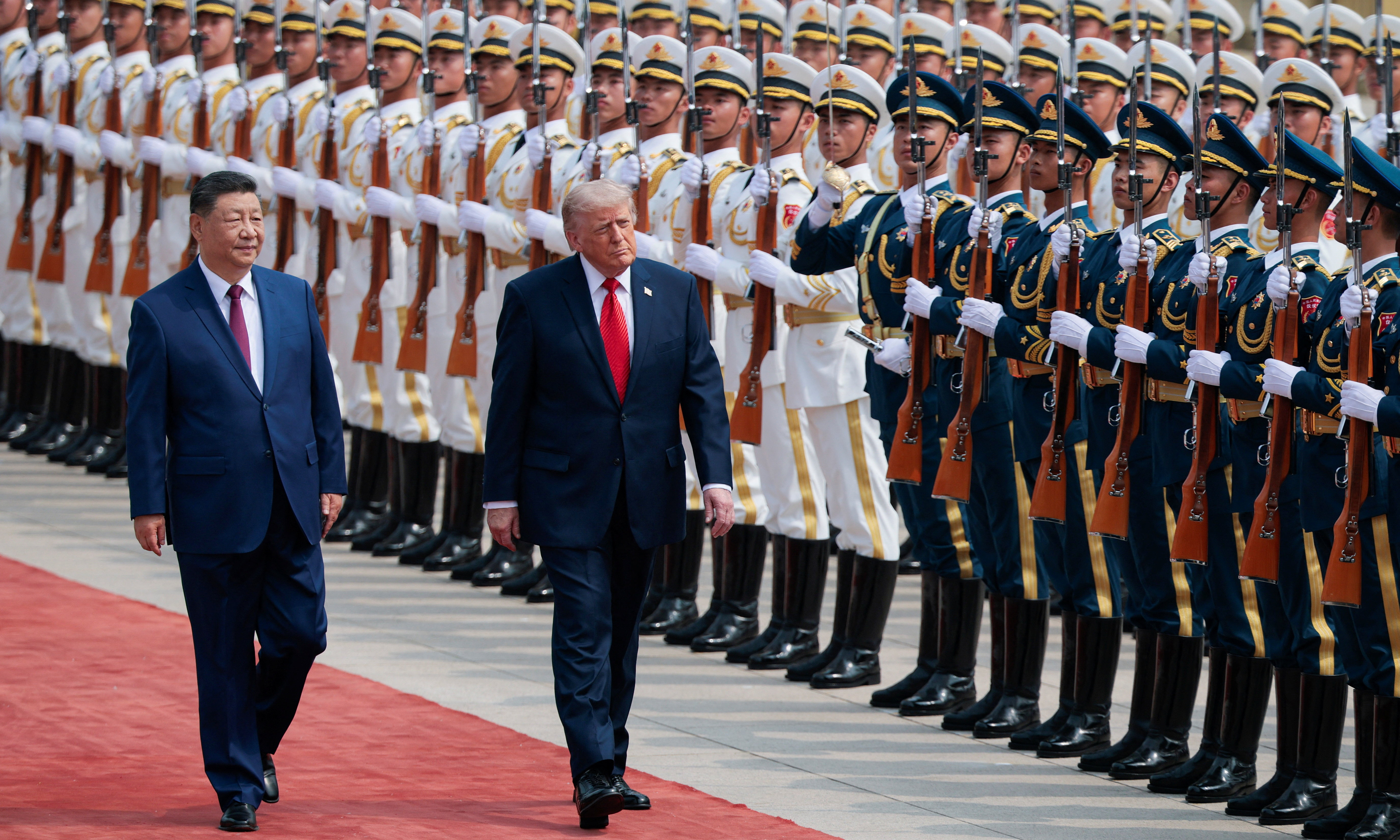 China fires 21-gun salute to welcome President Trump