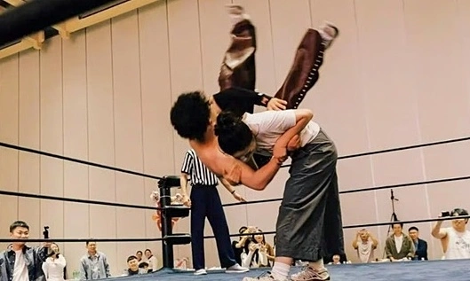 Wedding day wrestling match: couple battles for lifelong exemption from housework