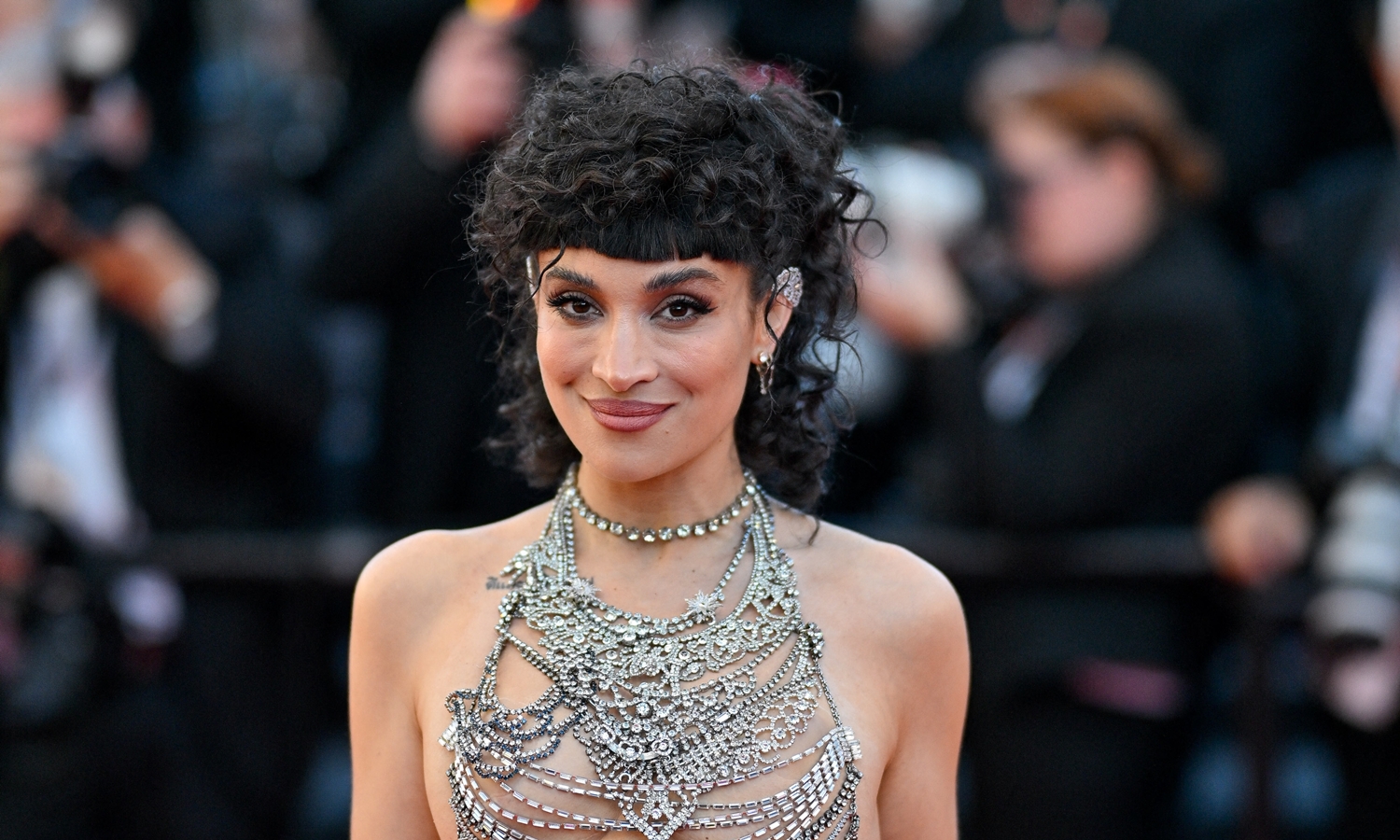 French actress showcases daring style alongside Cannes stars
