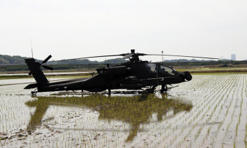 US armed helicopter makes emergency landing, stuck in rice field for days
