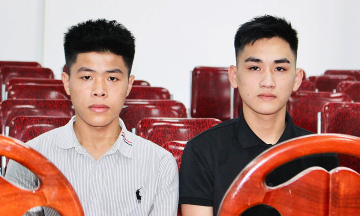 Two male students receive "Brave Youth" badge for saving friend from bridge jump