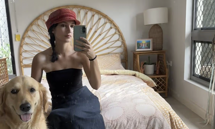 Young woman lives rent-free through house-sitting