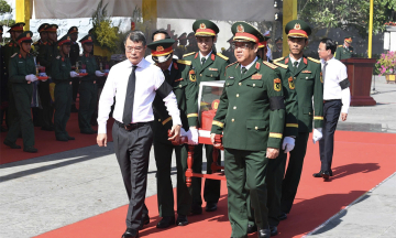 Prime minister attends memorial and reburial ceremony for 28 fallen soldiers at road 9 cemetery
