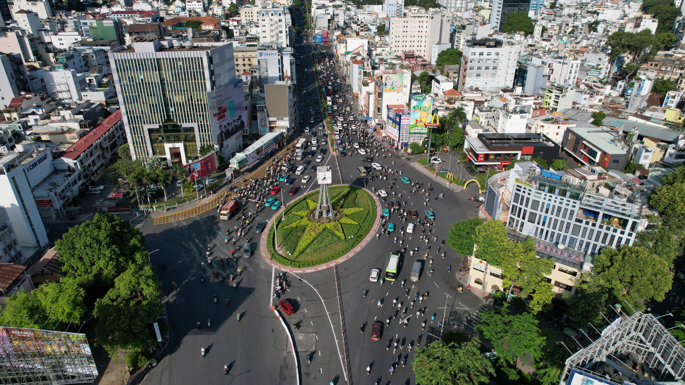 Central Ho Chi Minh City roundabout regulated by traffic lights