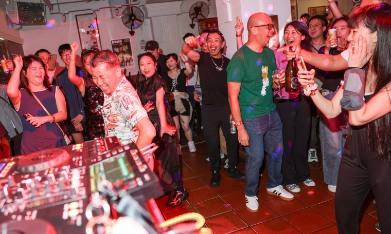 Centuries-old tea house hosts DJ party to attract young customers