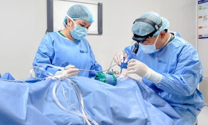 How to treat snoring in children caused by enlarged tonsils?