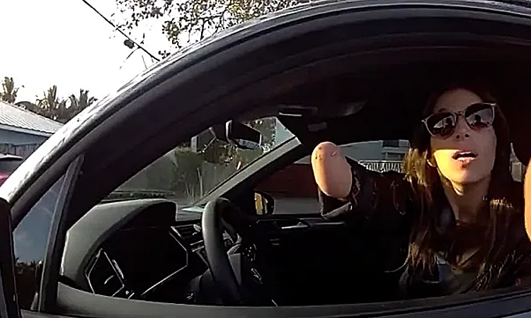 Woman with missing hand accused of 'holding phone while driving'
