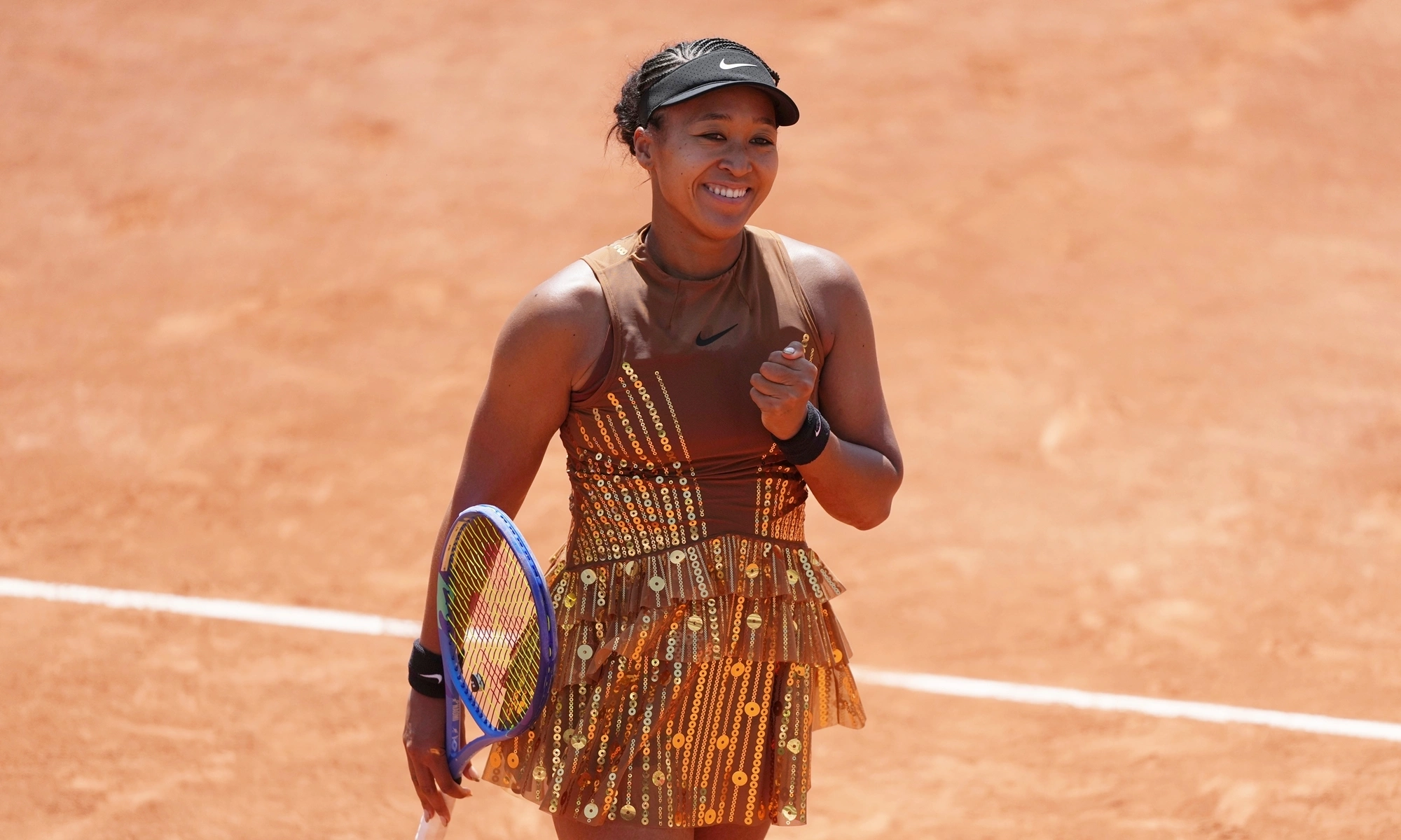Naomi Osaka wears sequin dress on court