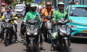 Proposal for ride-hailing drivers, online sellers to pay mandatory social insurance