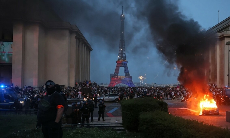 Why do French people often riot after football victories?