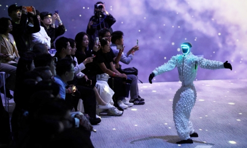 Robots compete on the catwalk with humans