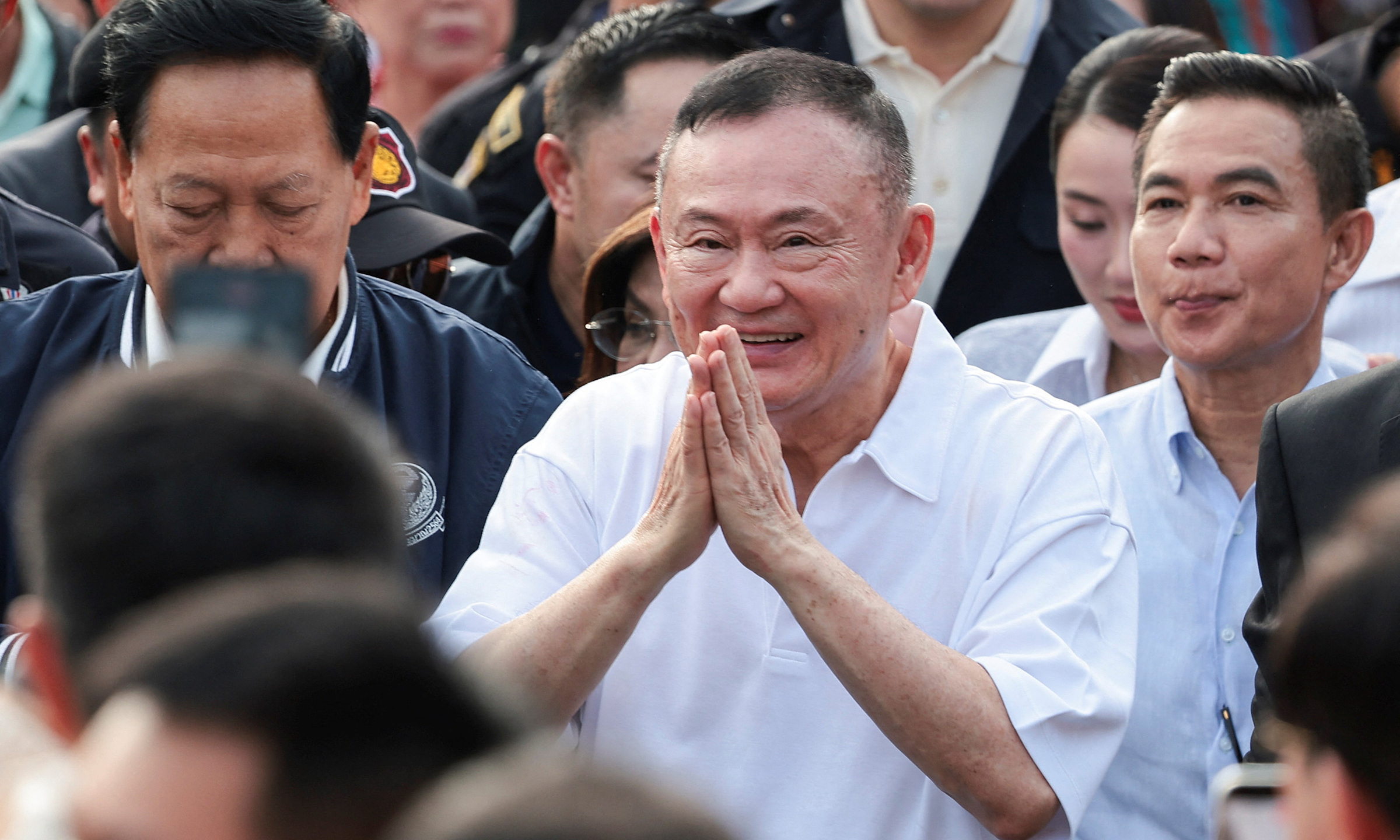 Thaksin granted pardon, electronic monitoring removed three months early