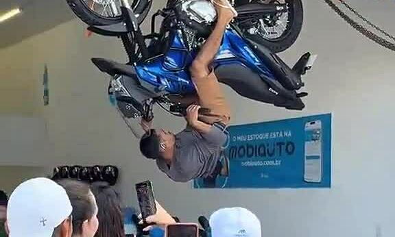 Inverted motorcycle challenge dares customers to a 'Spider-Man' feat