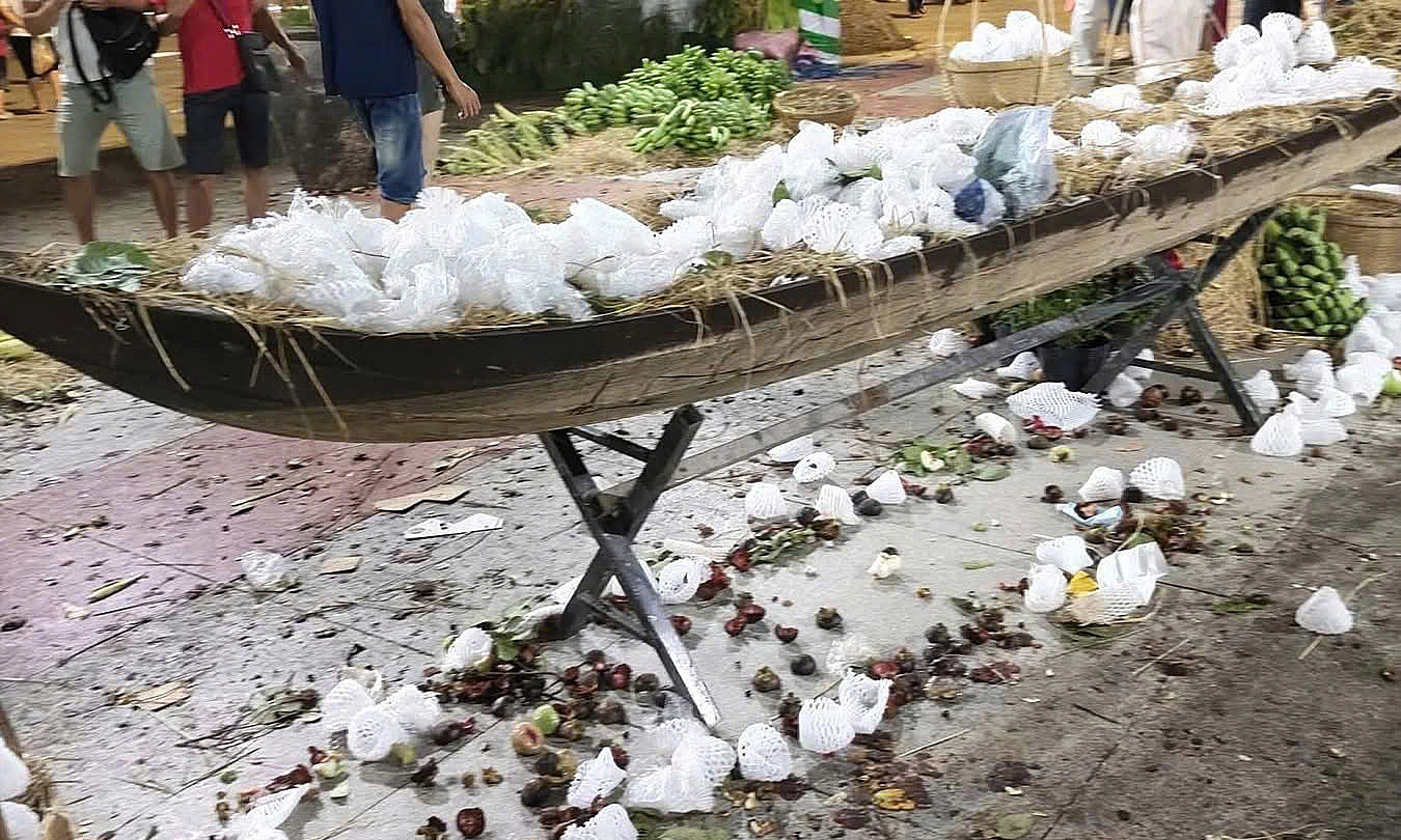 Visitors stripped bare display fruit at a festival in Dong Thap