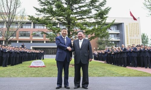 Xi Jinping and Kim Jong-un plant a tree