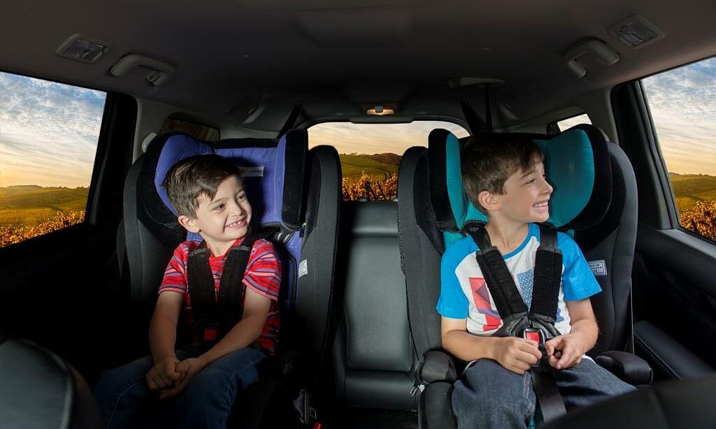 How to legally install child seats in a 5-seater car for a family with three children?