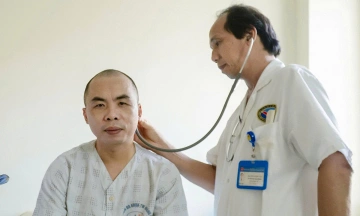 Removing a vascular malformation from a man's head
