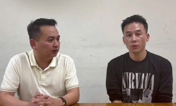 Fugitive returns to Vietnam to surrender after a year on the run in Malaysia
