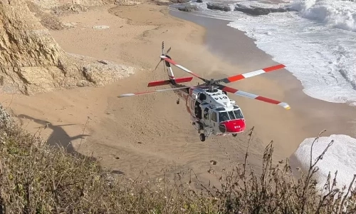 Two young women die after being swept away by waves while sleeping on beach