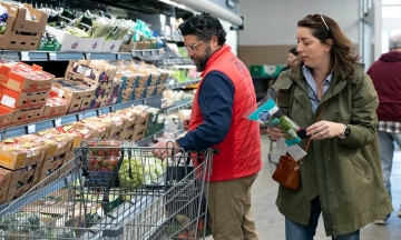 American families "tighten their belts" as income falls short of expenses