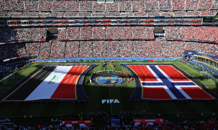 Why Saudi Arabia and Iraq's flags are not placed on the ground at the World Cup
