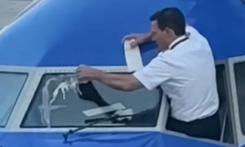 Why do pilots clean aircraft windshields with soda?
