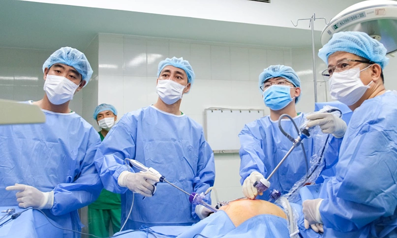 An 81-year-old woman diagnosed with colon cancer after a week of abdominal pain and bloody stools