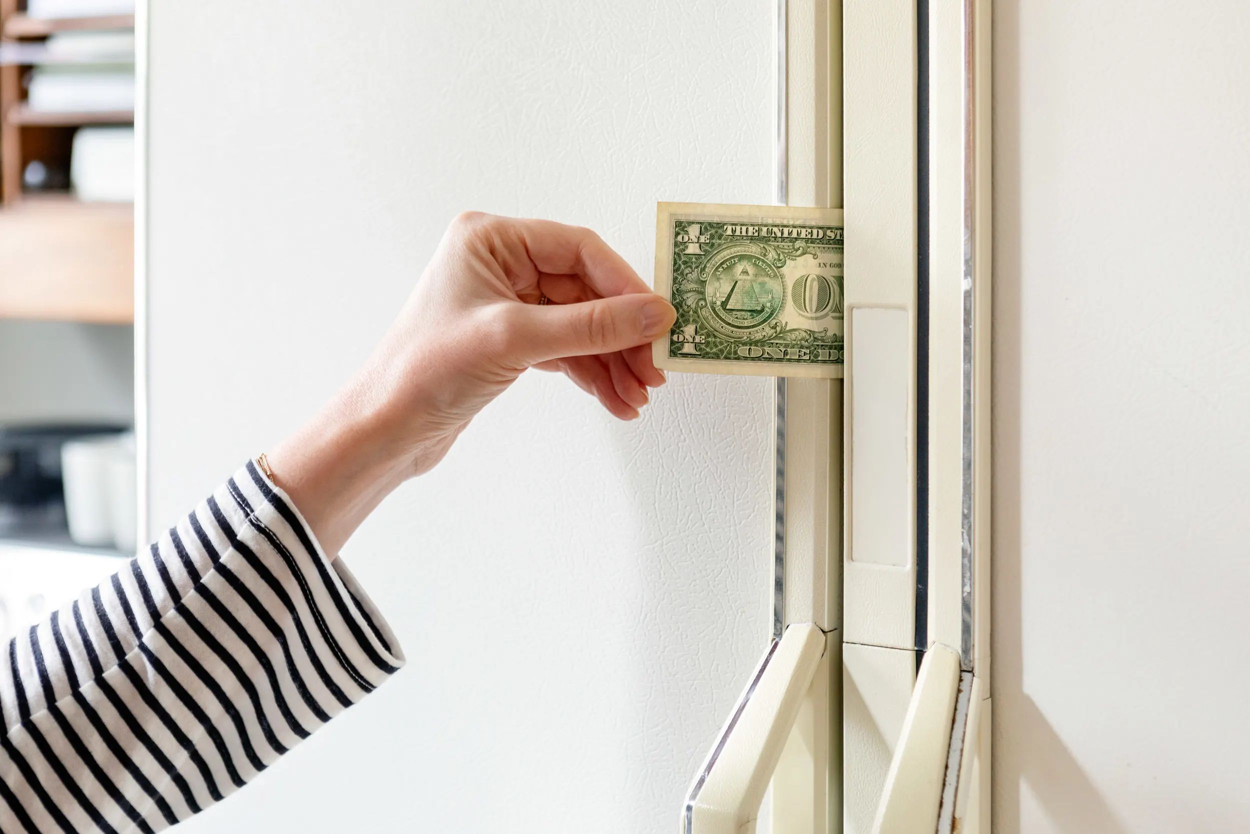 Why do many people put money in refrigerators?
