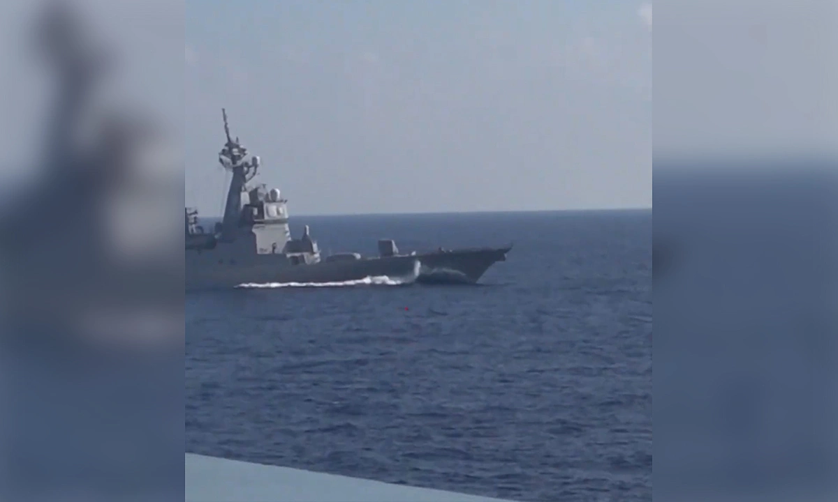 China accuses Japan of 'harassing aircraft carrier'