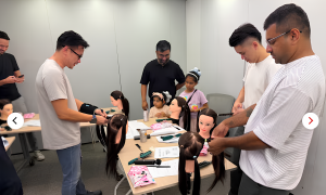 Dads learn to braid their daughters' hair