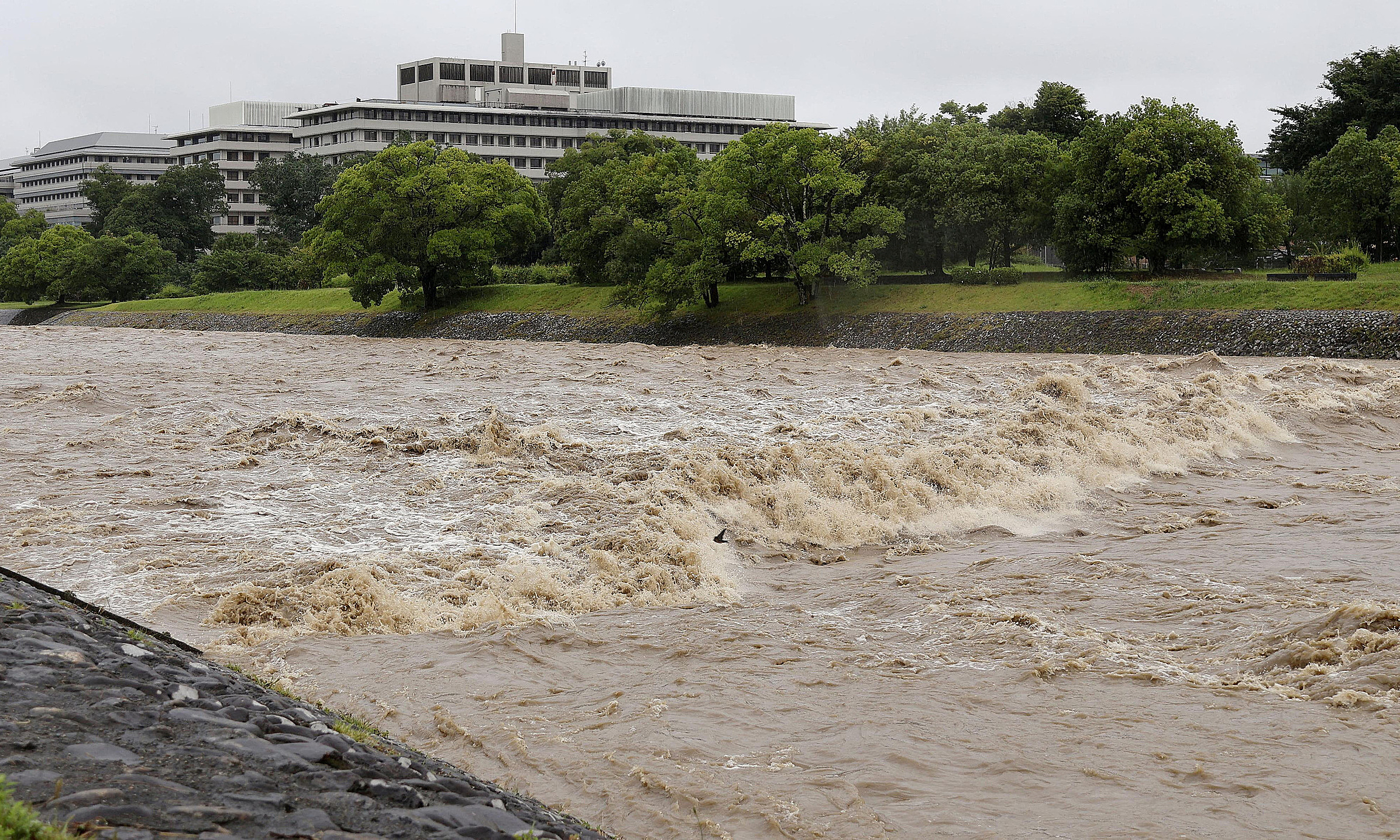 Japan faces a double storm