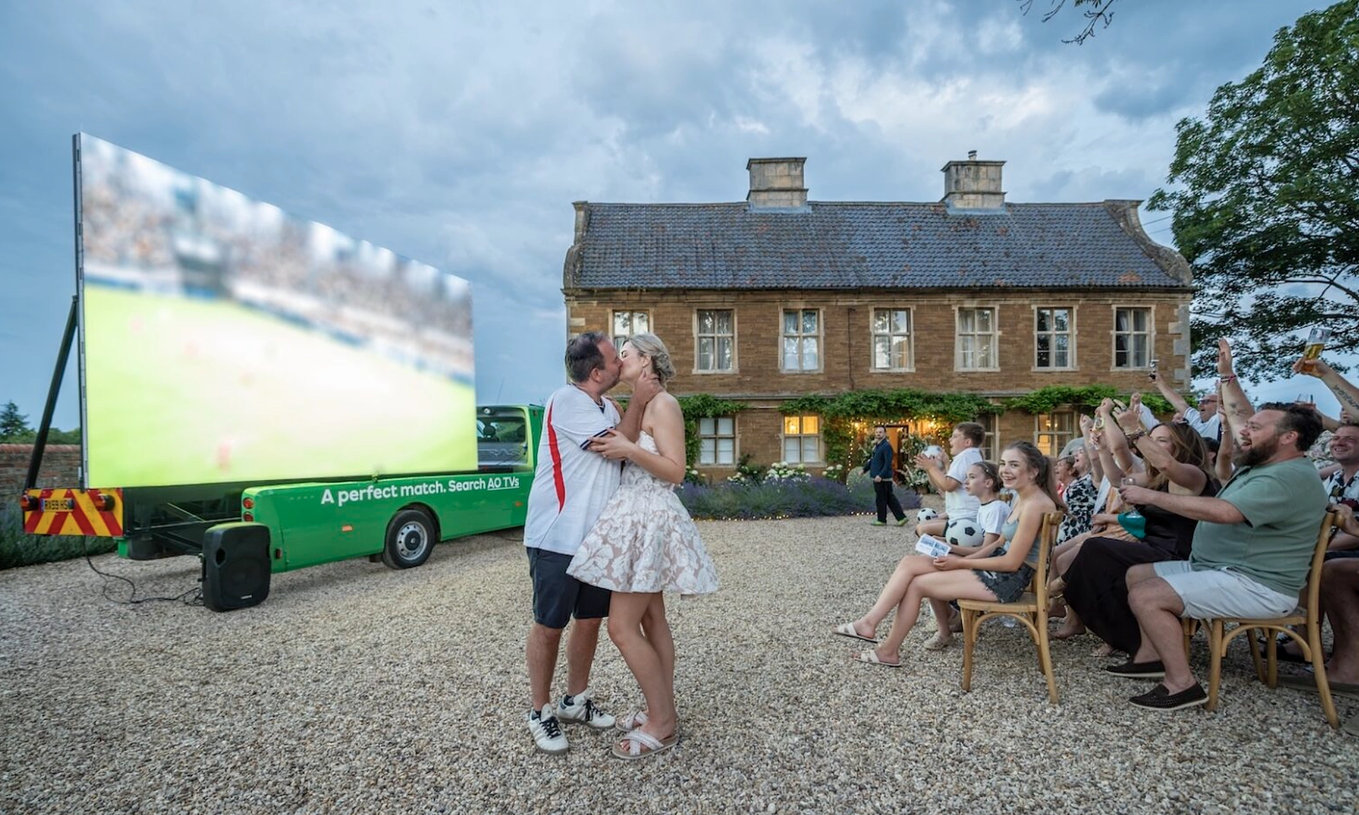 Bride surprises groom with 210-inch screen at wedding for England match