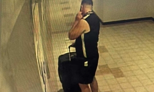 Man arrested after Thai teenager's body found in suitcase