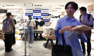 Readers queue at midnight for new Murakami book
