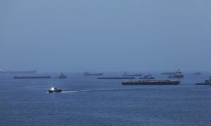 How much has oil and gas flow through Hormuz recovered?