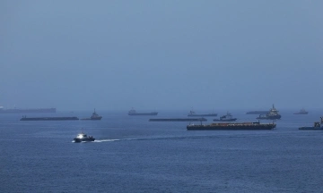 How much has oil and gas flow through Hormuz recovered?