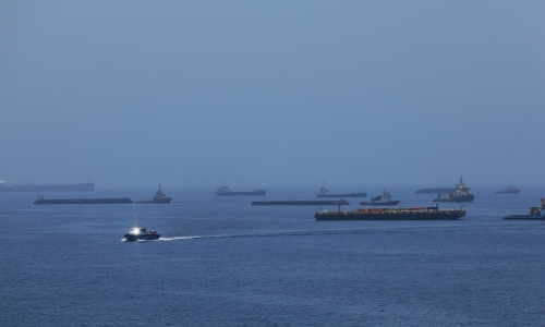 How much has oil and gas flow through Hormuz recovered?