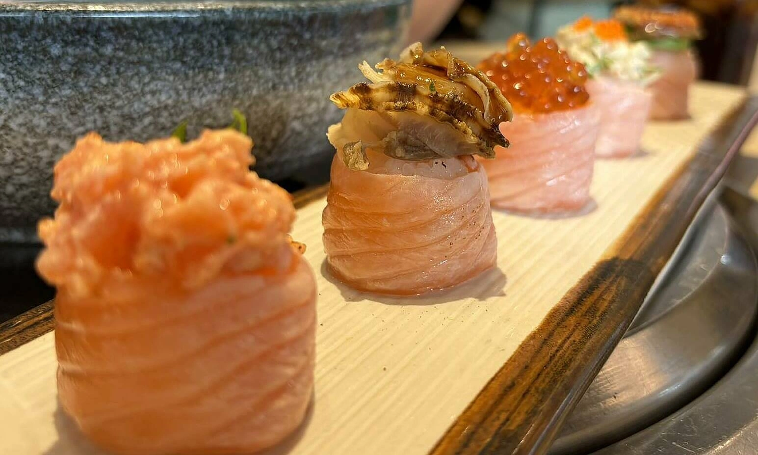 What happens to blood sugar when regularly consuming salmon?