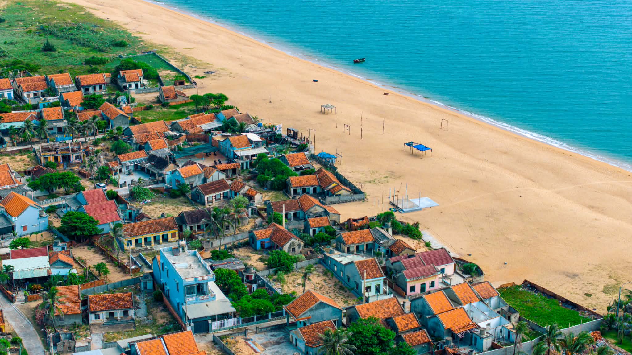 A peaceful red-tiled village by the sea of Dak Lak