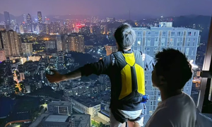 Permanently banned from social media for base jumping from apartment building to 'attract likes'