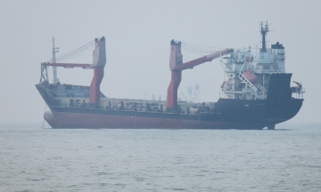 Iran fires 'warning shots' at two ships in Hormuz