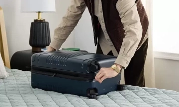 The worst place to put your suitcase in a hotel room