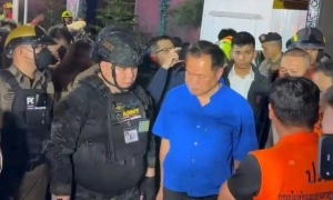 Thailand investigates man suspected of impersonating officer at pub fire